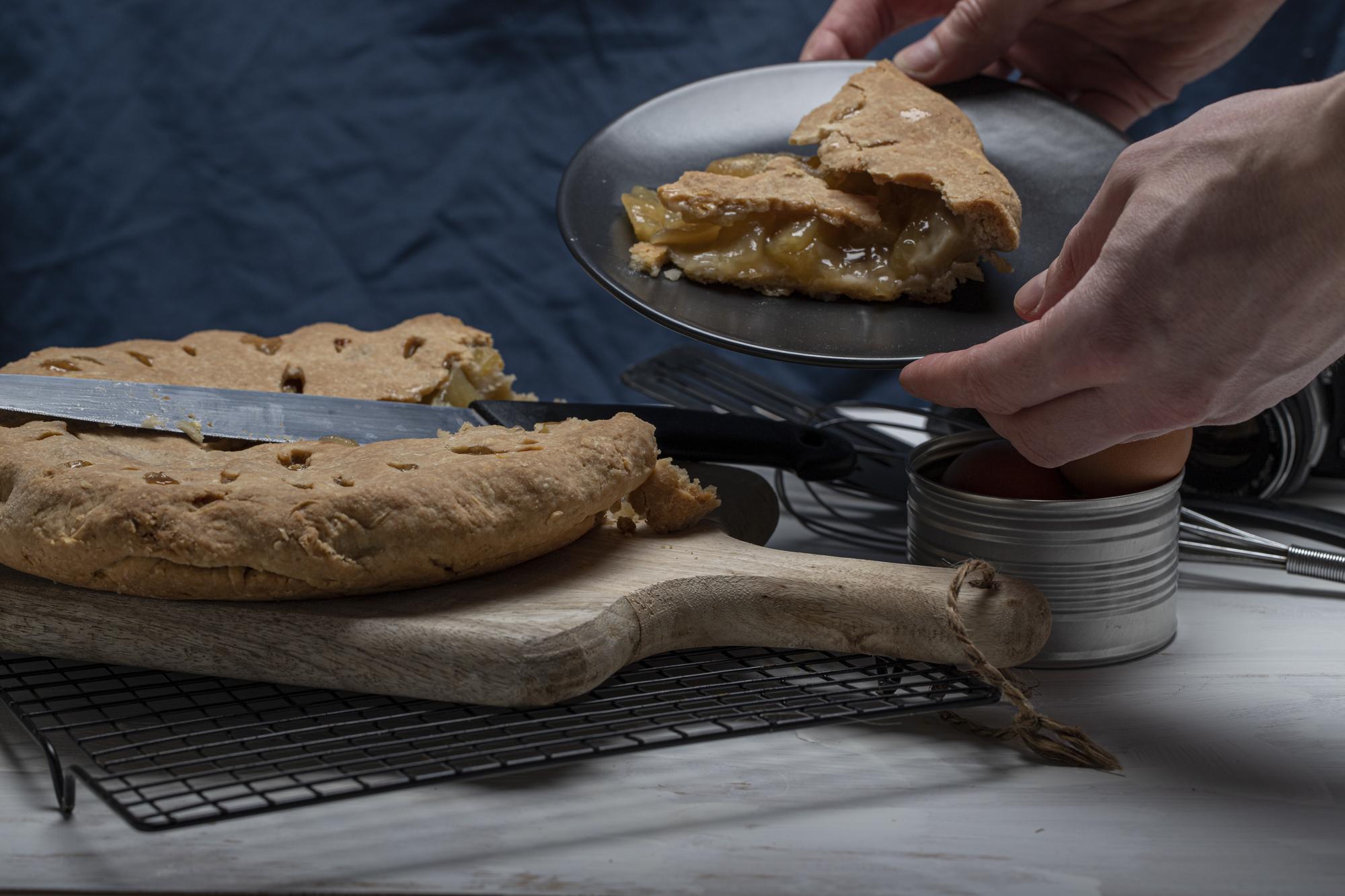 Artisan kitchen counter with plated desserts and parchment